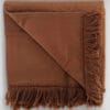 Tapis de prière marron plié
