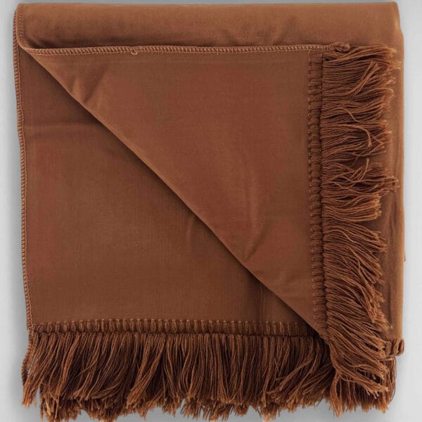 Tapis de prière marron plié